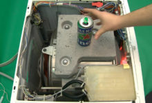 Photo of Washing machine INTERIOR during washing 1600 rpm and Haineken beer :)